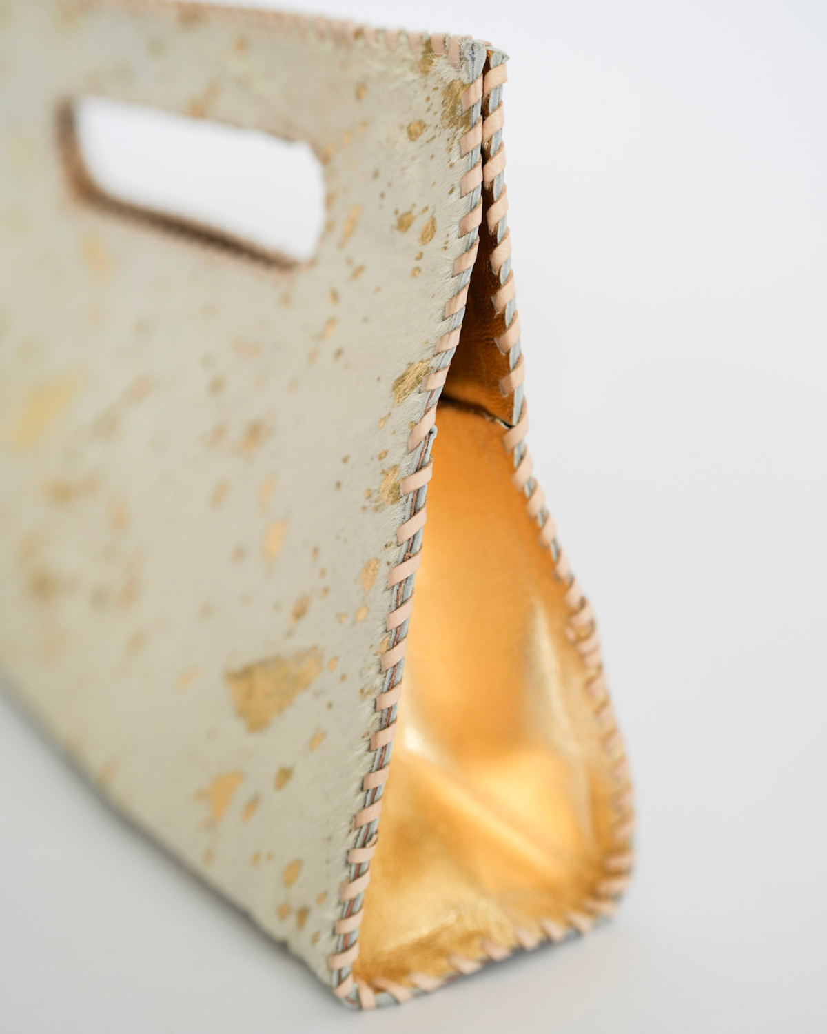 Mia Clutch Cowhide Hairon Leather