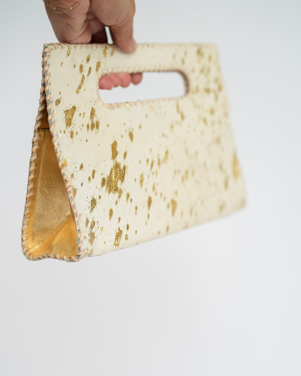 Mia Clutch Cowhide Hairon Leather