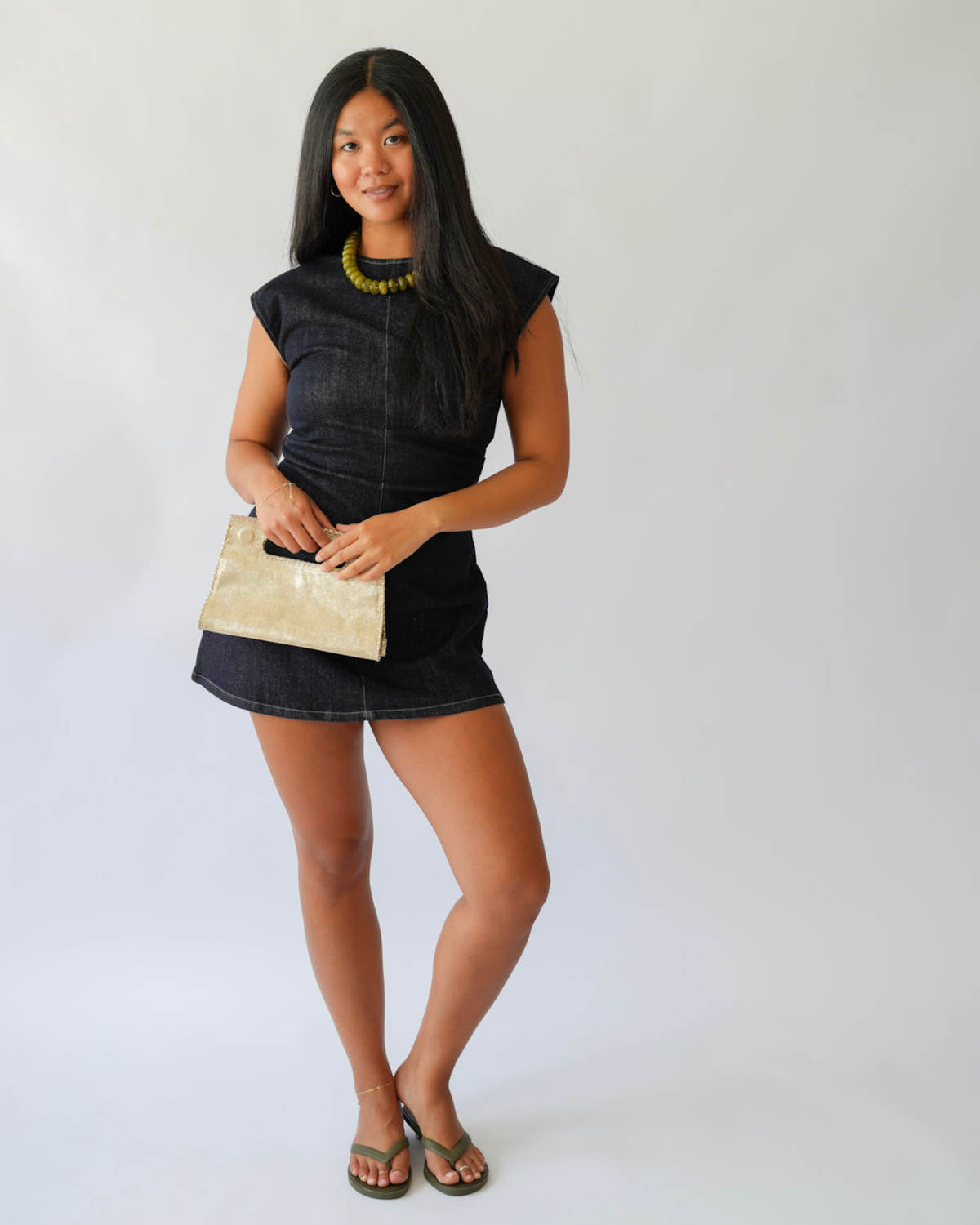 GIrl in dark demin mini dress 